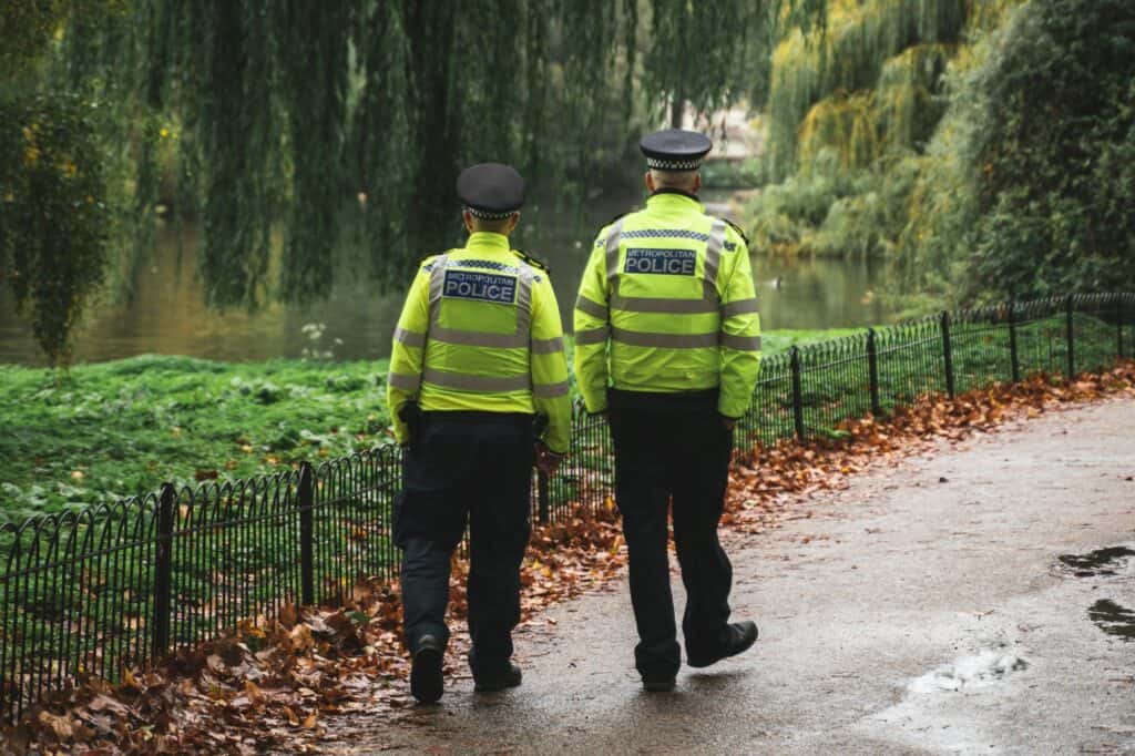 Two policemen patrolling the park